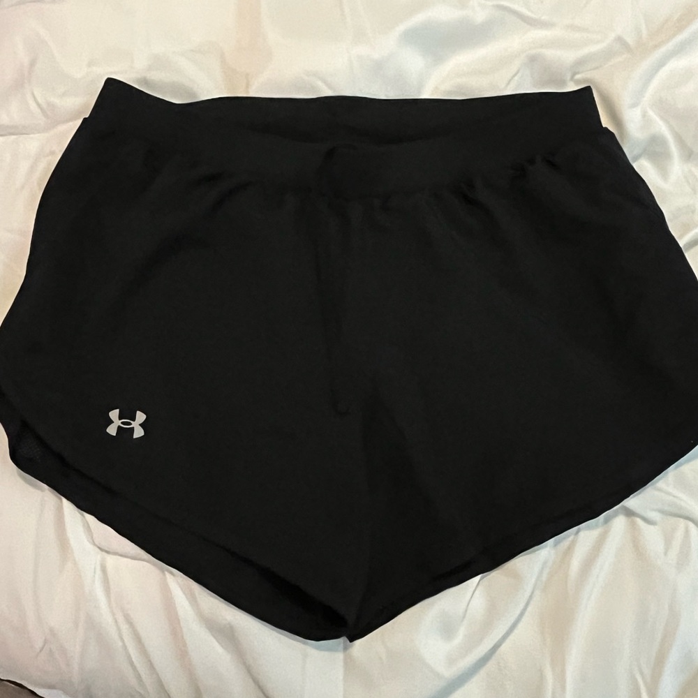 Black Under Armour running shorts with liner.